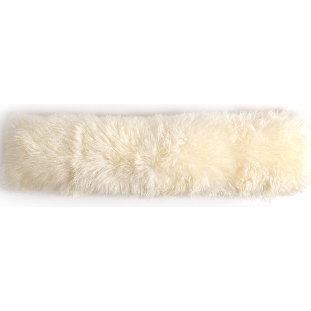 This image showcases a rectangular, plush white sheepskin lumbar pillow. The pillow features a soft and furry texture reminiscent of a luxury bed cushion, designed to provide added comfort for lumbar support. The fur appears dense and plush, exuding a luxurious appearance. The background is plain white.