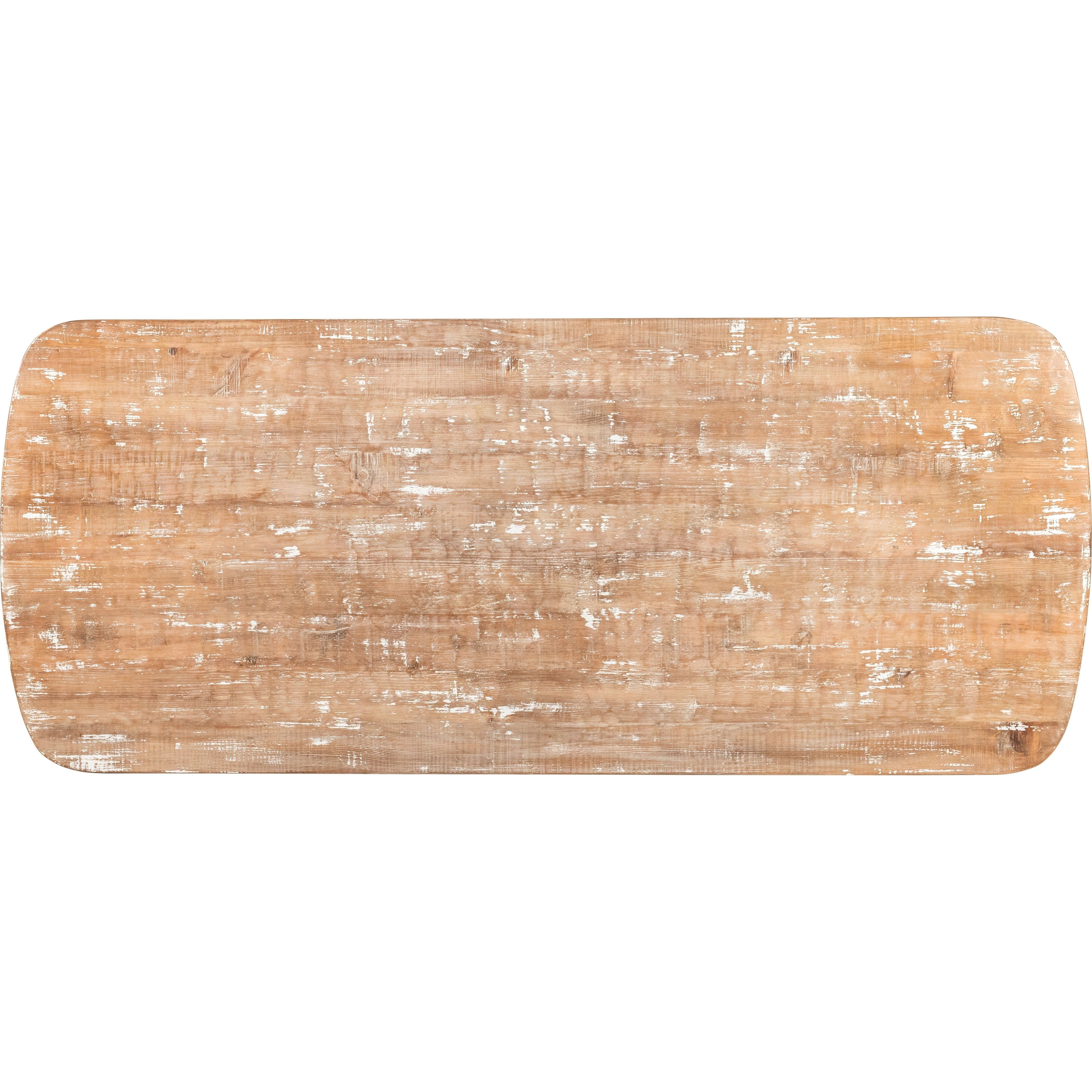 The Lexington Dining Table, made from reclaimed pine, features a rectangular design with rounded corners. Its distressed, weathered surface highlights light brown wood with visible grain patterns and faded white patches for a rustic sophistication. Set against a white background.