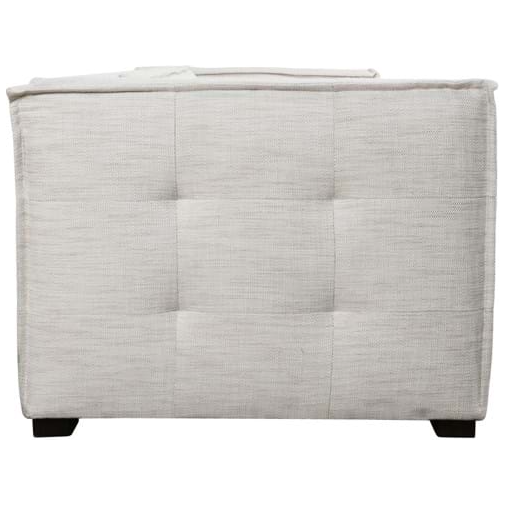 Front view of the Princeton Sofa in beige, showcasing button tufting and square stitching with a soft texture. Its cushioned top sits on four dark wooden legs, contrasting with the upholstery. A folded white blanket rests partially visible on top.