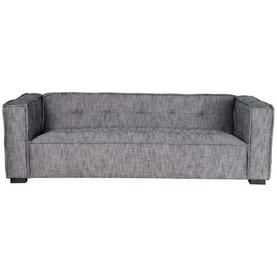 The Princeton Sofa in Charcoal is a modern gray fabric piece with a boxy design, thick square armrests, and a low backrest. It features tufted seat cushions for elegance and durability with its polyester mix. The sofa sits on low dark wooden legs and has a subtle textured look.