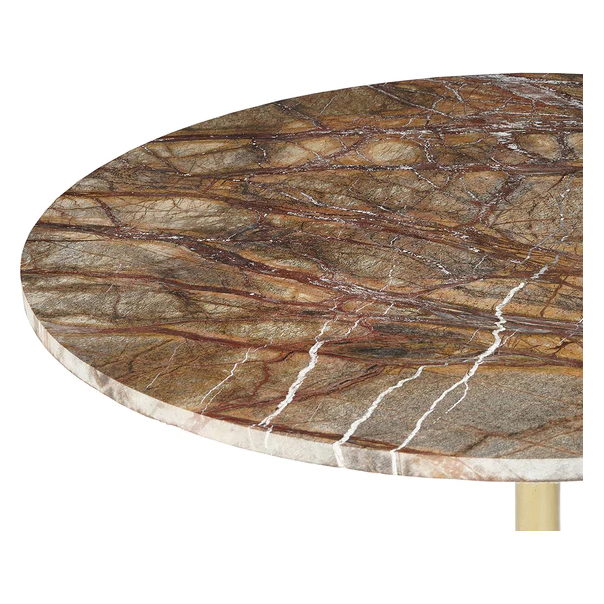 A close-up of a round Sierra Café Table with an antique-finished Bidasar Brown Marble tabletop, showcasing intricate natural patterns and veins in shades of brown, beige, and white. The edge exhibits a polished finish, and a brass-finished cast-iron base is partially visible beneath it. The background is plain white.