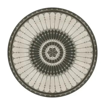 Introducing the Heath Round Vinyl Rug: This exquisitely detailed piece features a striking central floral motif encircled by layers of geometric patterns in elegant shades of beige and dark gray. The outermost layers showcase fashionable teardrop shapes and serrated edges, culminating in a beautifully symmetrical, mandala-like design.