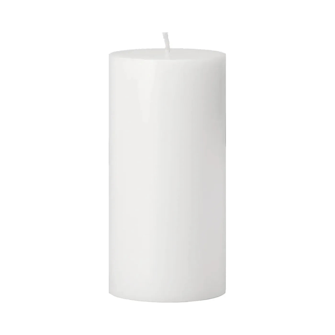 The Pillar Candle is a plain, white, cylindrical candle with a smooth surface and a short, centered wick. It stands upright against a white background and is unlit.