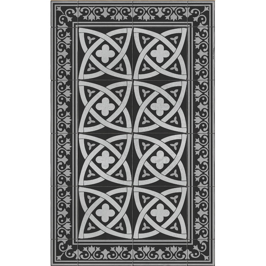 The Ackley Vinyl Rug features a rectangular tile pattern with intersecting curved lines and cloverleaf shapes in gray on black, highlighted by a central geometric motif and a decorative border of scrollwork and floral elements.