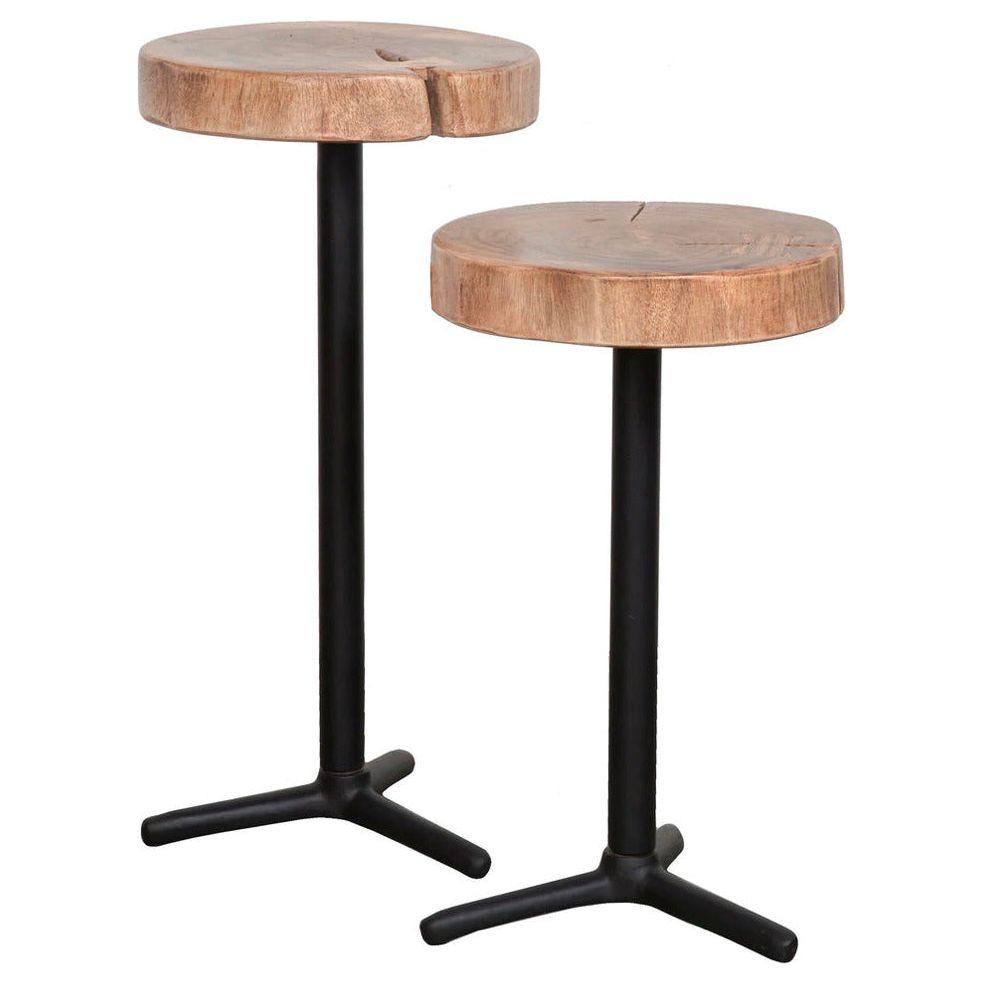 The Nesting Martini Side Tables (set of 2) feature round, thick solid acacia wood tops and black powder-coated steel frames. One table is taller; both display unique natural grain for a rustic, modern look. Shown side by side against a white background.