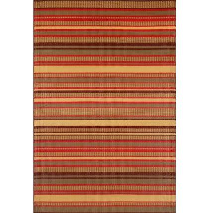 The Outdoor Rug Warm Stripes features a rectangular design adorned with horizontal stripes of varying widths. Crafted from recycled materials, it showcases shades of red, orange, brown, and beige, creating a warm and earthy aesthetic. Its durable construction and woven texture make this eco-friendly rug an ideal complement to any space.
