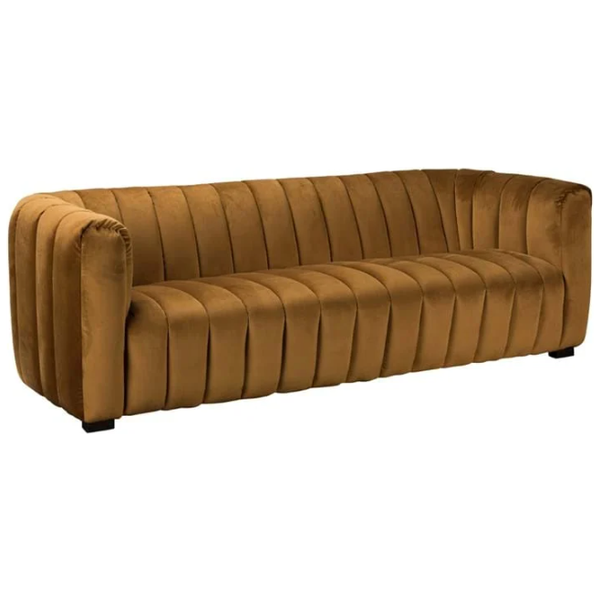 The Donna Upholstered Sofa boasts a modern, curved design in brown velvet, featuring sculptural curves with deep vertical channel tufting on the backrest and armrests. Its smooth seat surface, plush cushioning, and low black rectangular legs create a luxurious and stylish look.