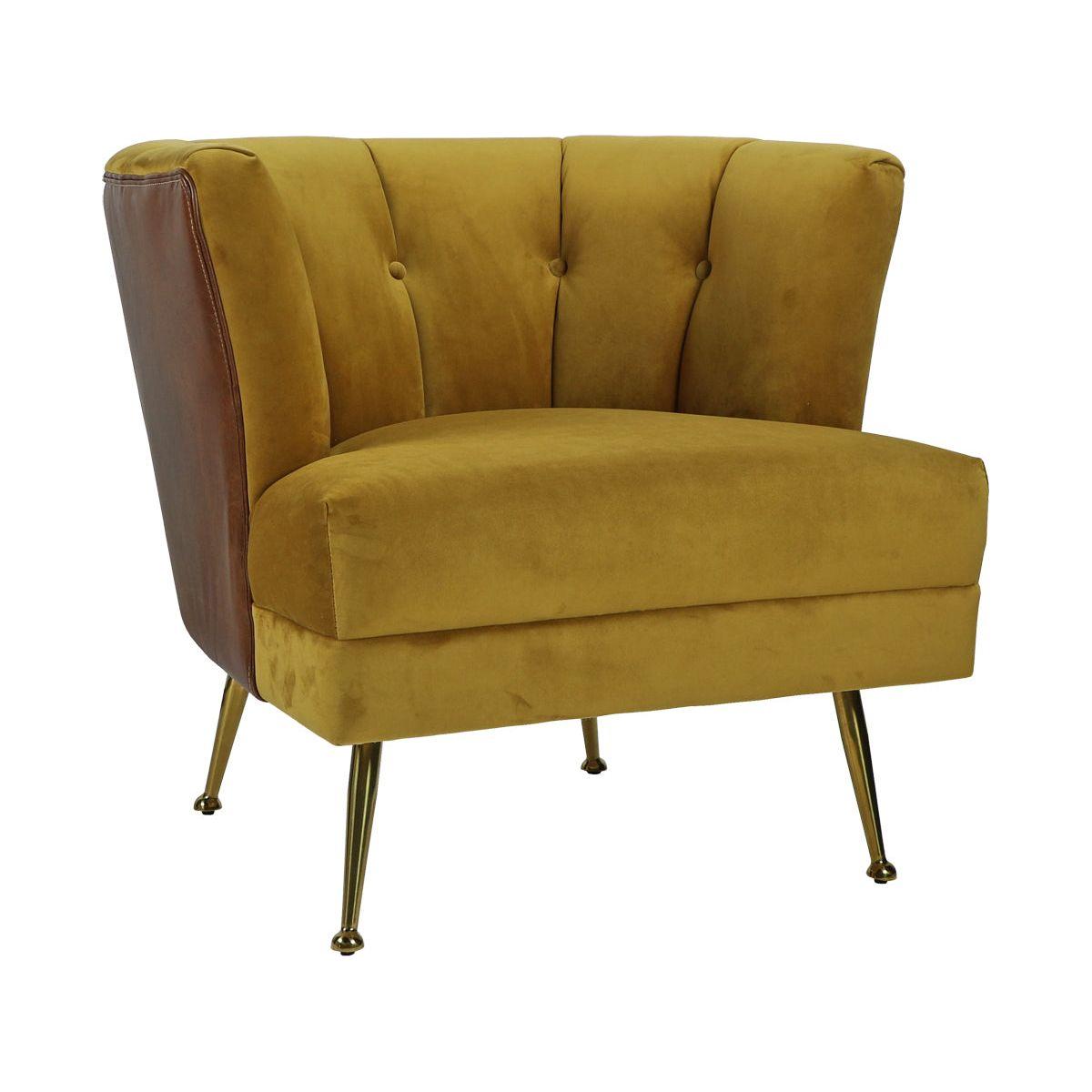 The Lobby Accent Chair features mid-century modern style with mustard yellow velvet, a channel-tufted backrest, angled brass legs, and brown leather accents on the back corners for a bold retro contrast.