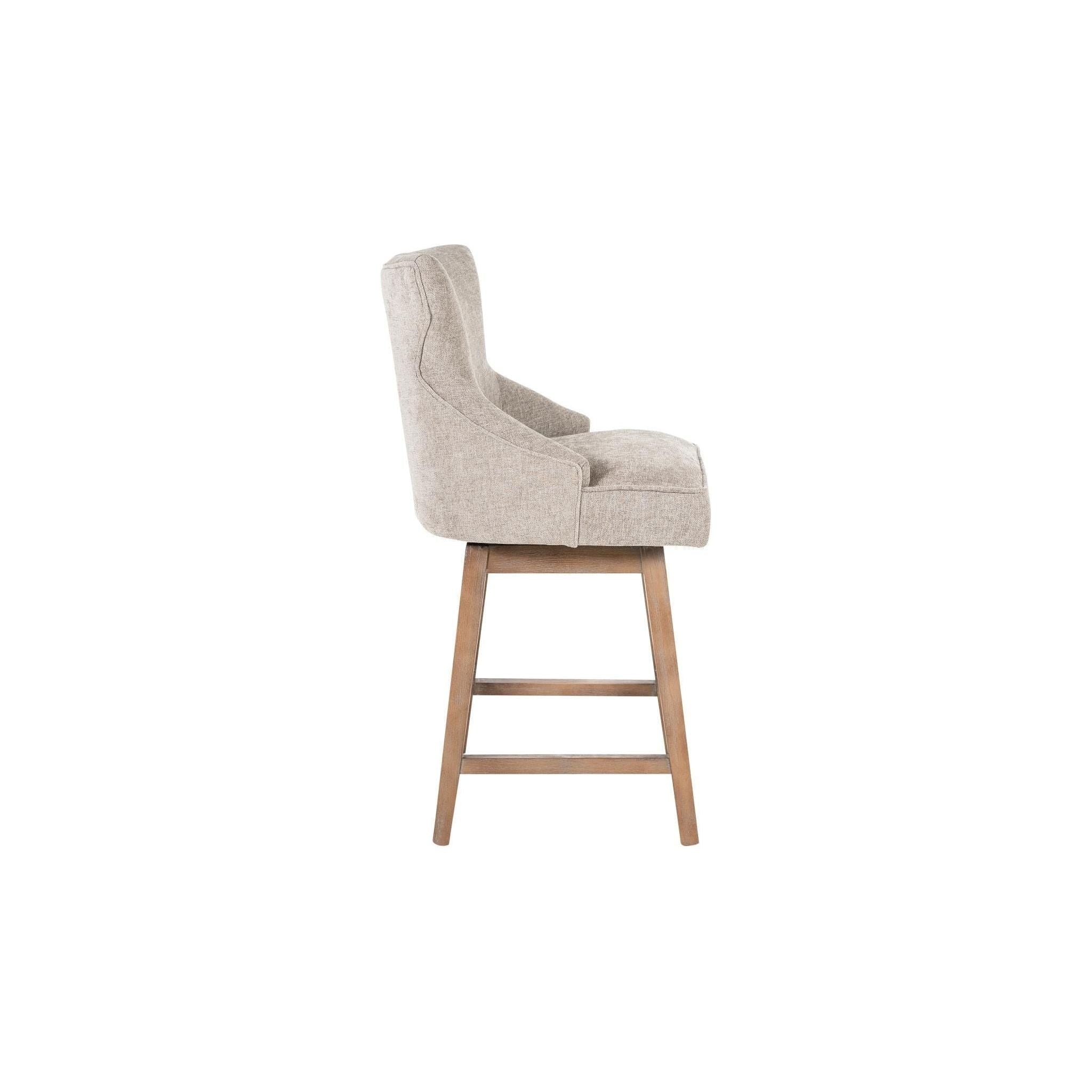 Side view of the Letty Swivel Counter Stool featuring modern gray polyblend upholstery with a cushioned back and seat. The stool is supported by a gray-washed oak base with four legs connected by two horizontal bars. The design is modern and simple, combining comfort with clean lines.