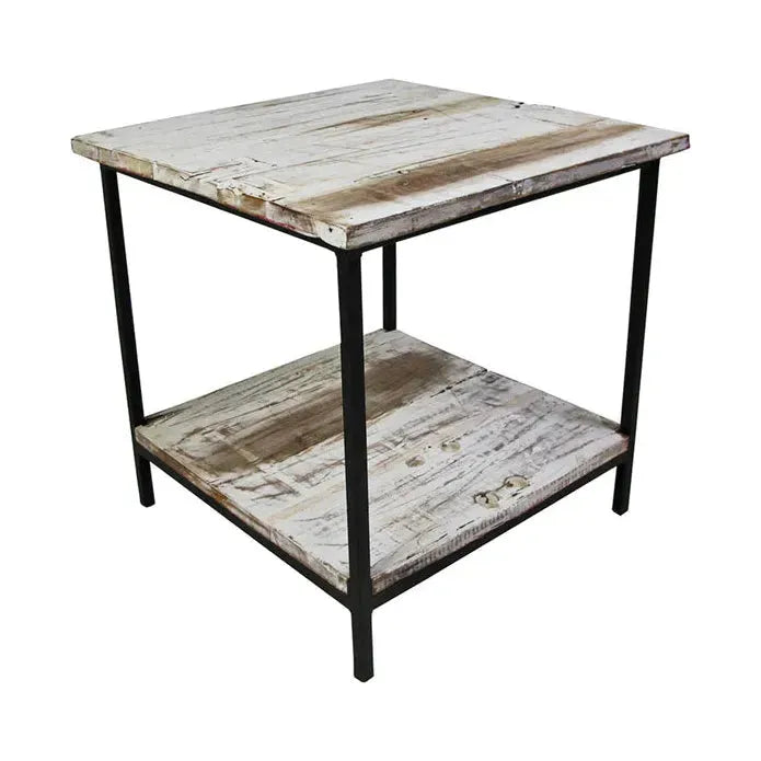 The Farmer Side Table features a square distressed white frame, weathered wooden top, matching lower shelf, black metal legs at each corner, and a rustic industrial design with visible wood grain for a vintage look.