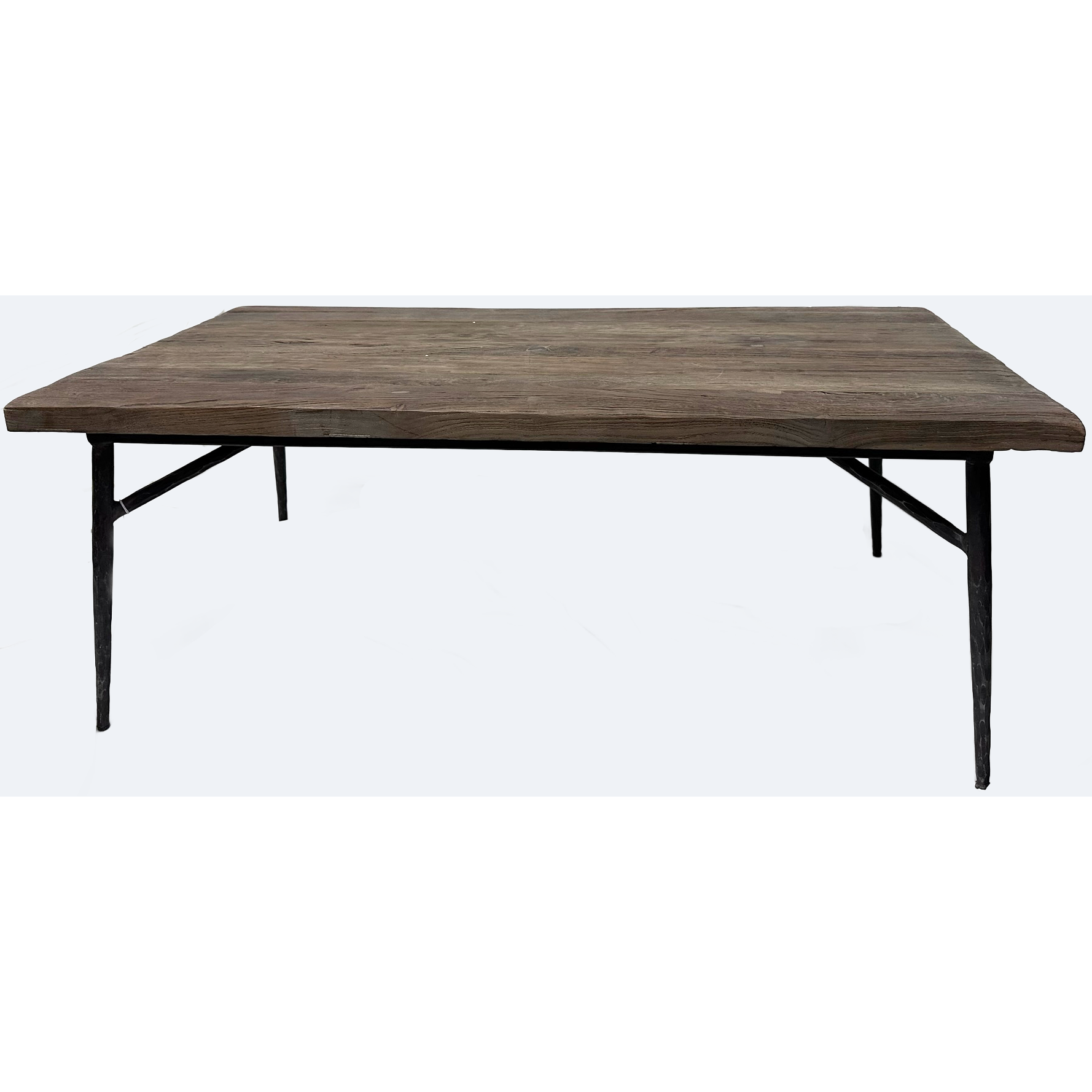 The Gretel Rustic Wood Coffee Table features a large rectangular reclaimed wood top with a weathered finish and slim black metal legs, showcasing its vintage and industrial style against a plain white background.